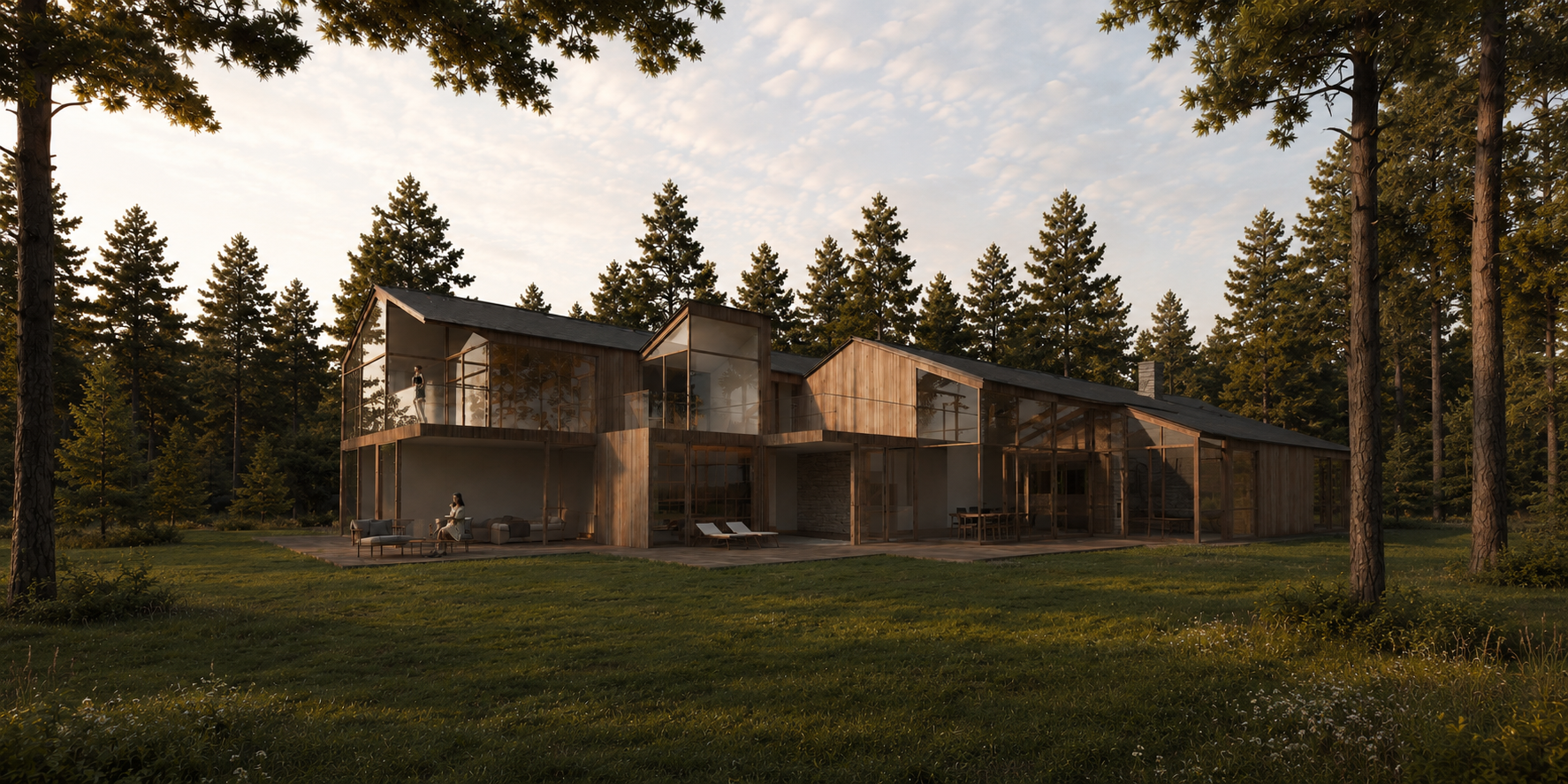 South elevation of the villa at dusk, seen from the forest clearing