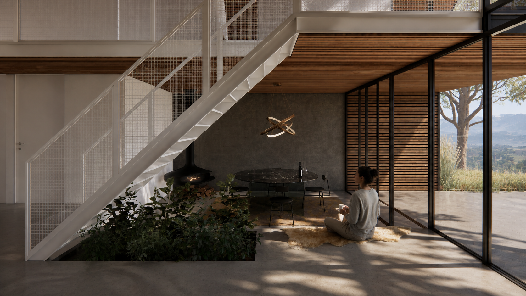 Courtyard between two volumes — pale stone and charred timber walls meeting a glazed glass link, with ornamental grasses set in dark gravel